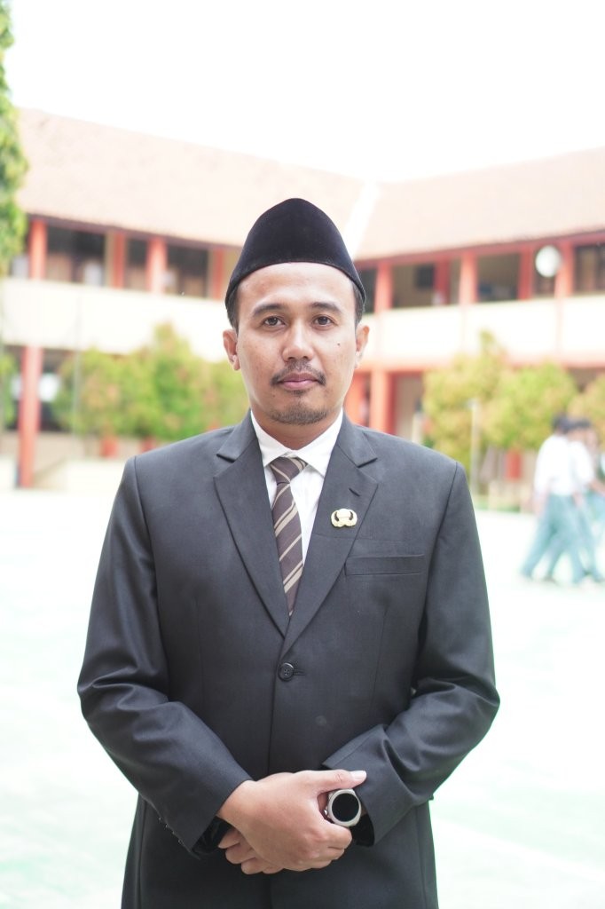 M. Yazidul Ulum, M.Pd.